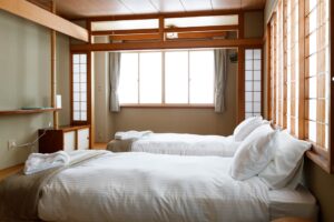 Premium Lodge Single Slot in Twin Share Room - shared bathroom